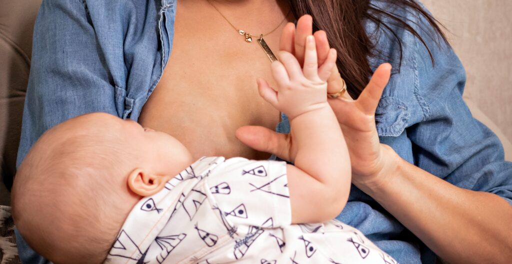 Mother and baby having an intimate moment while breastfeeding